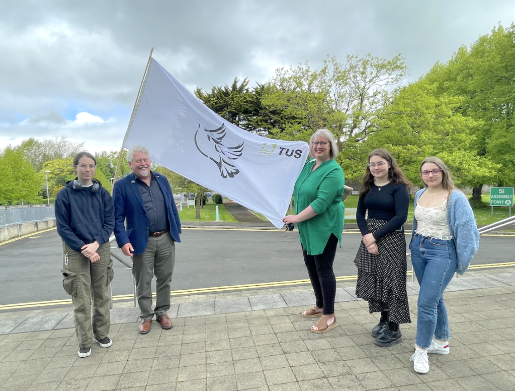Mike Fitzpatrick, Dean, Limerick School of Art and Design/Director of Cultural Engagement at TUS, is pictured at LSAD with students and staff, raising the peace flag,